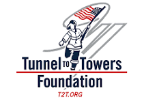 Firefighter carrying American flag with "Tunnel to Towers Foundation" text.